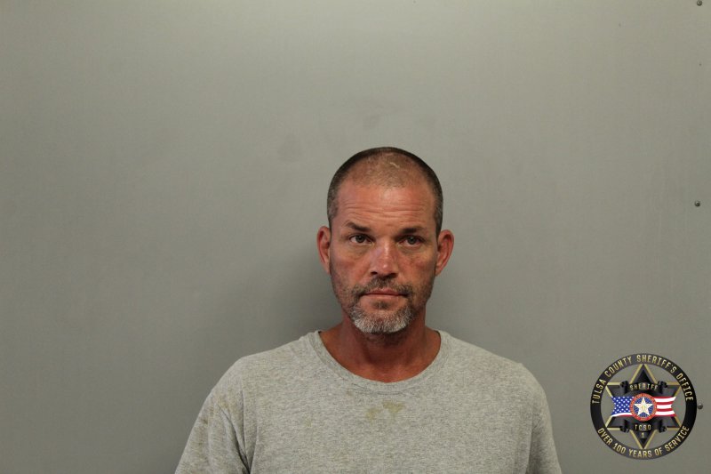 Booking photo of David Stiger