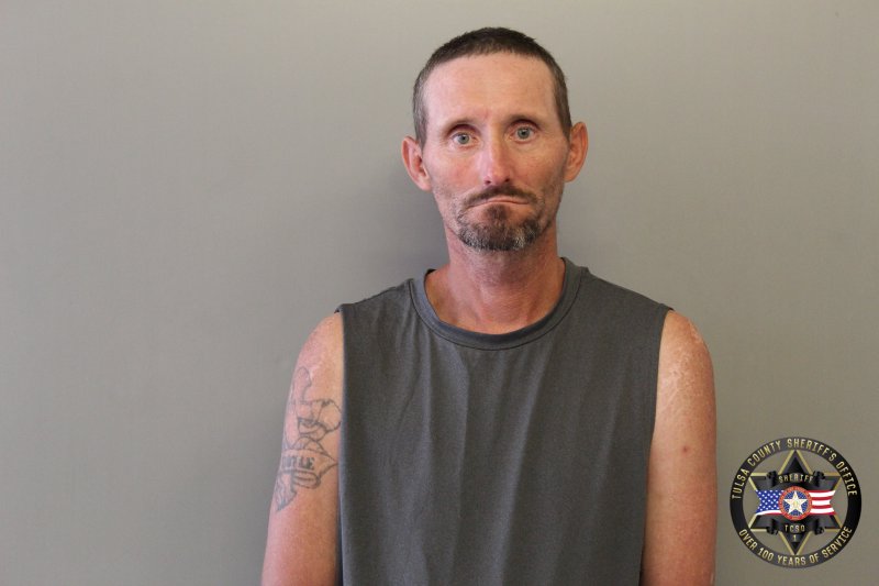 Booking photo of Russell Watson