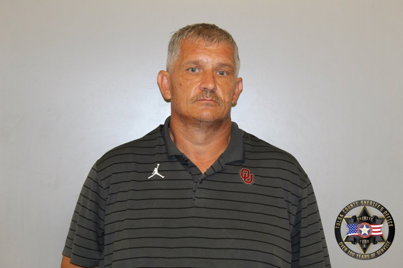 Booking photo of Michael Cook