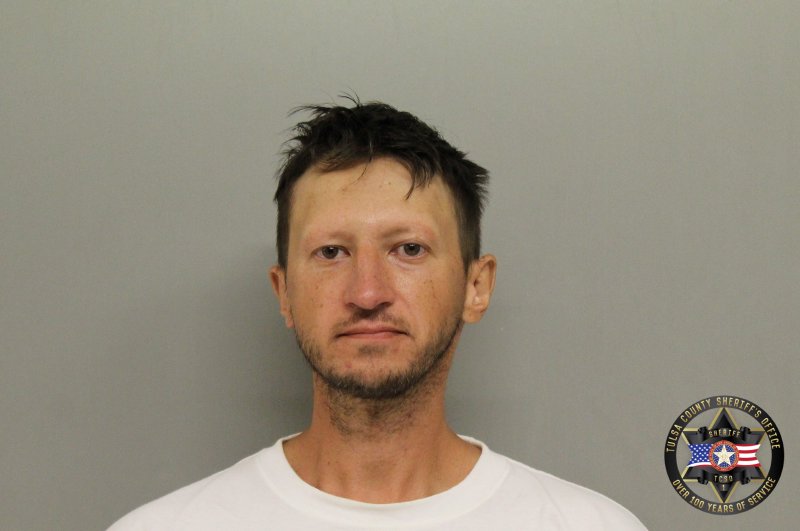 Booking photo of Aaron Stone
