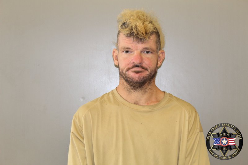 Booking photo of Samuel Raymond