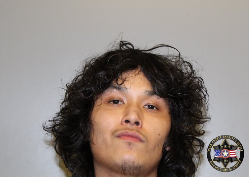 Booking photo of Melique Miles