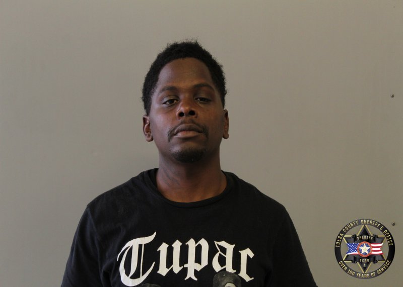 Booking photo of Michalin Gilbert