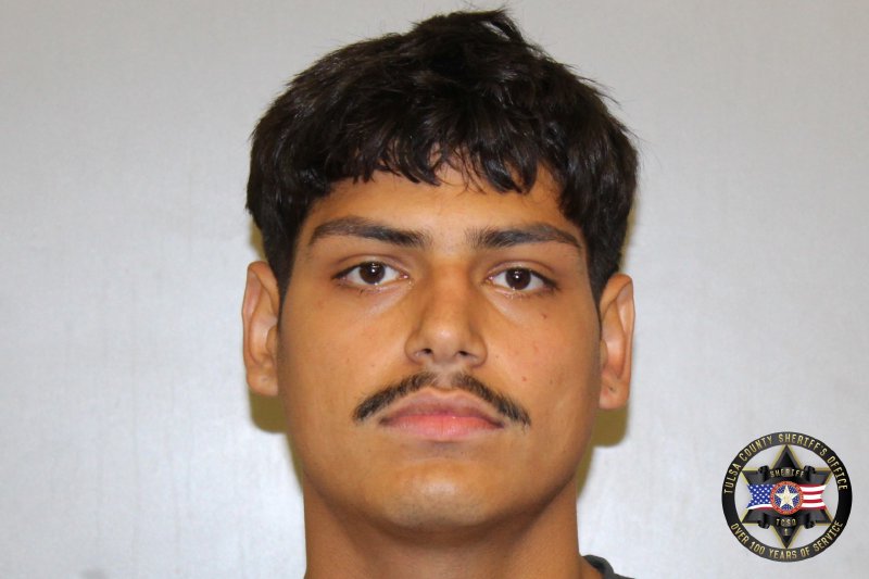 Christian Cox booking photo