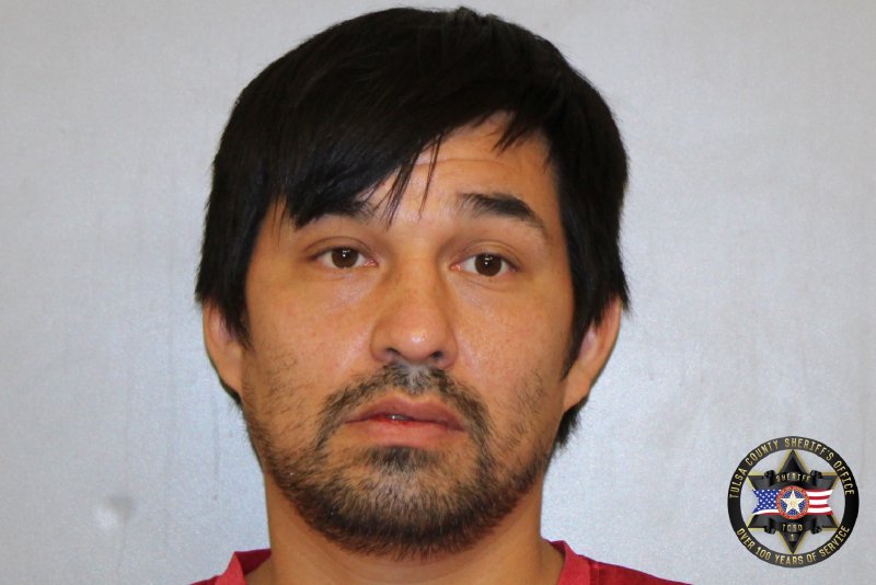 Jonathan Watashe booking photo