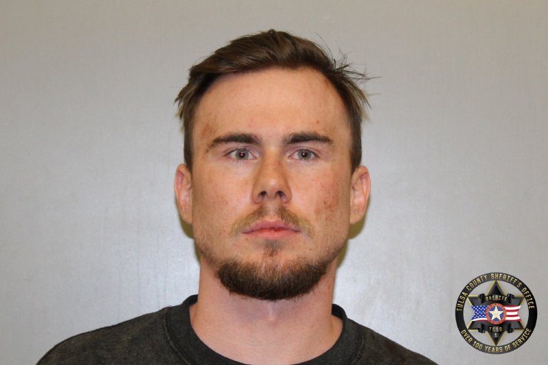 Cade Looman booking photo
