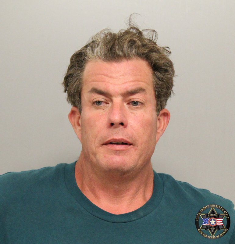Adam Reid booking photo