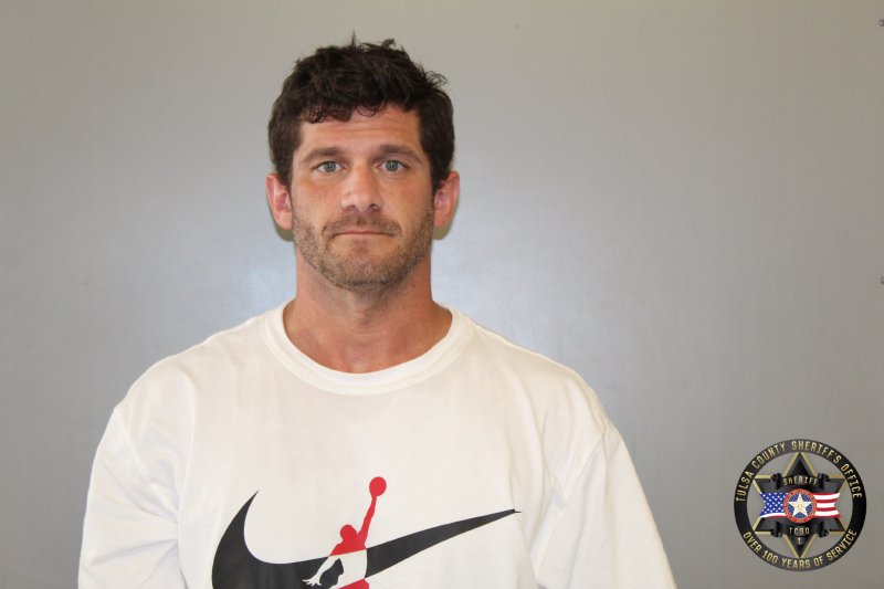 Booking photo of Christopher Greene