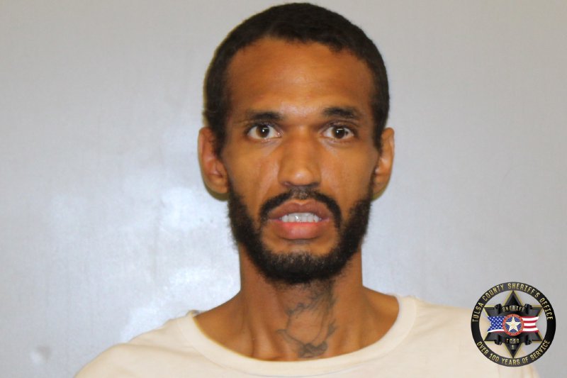 Booking photo of Christopher Lee
