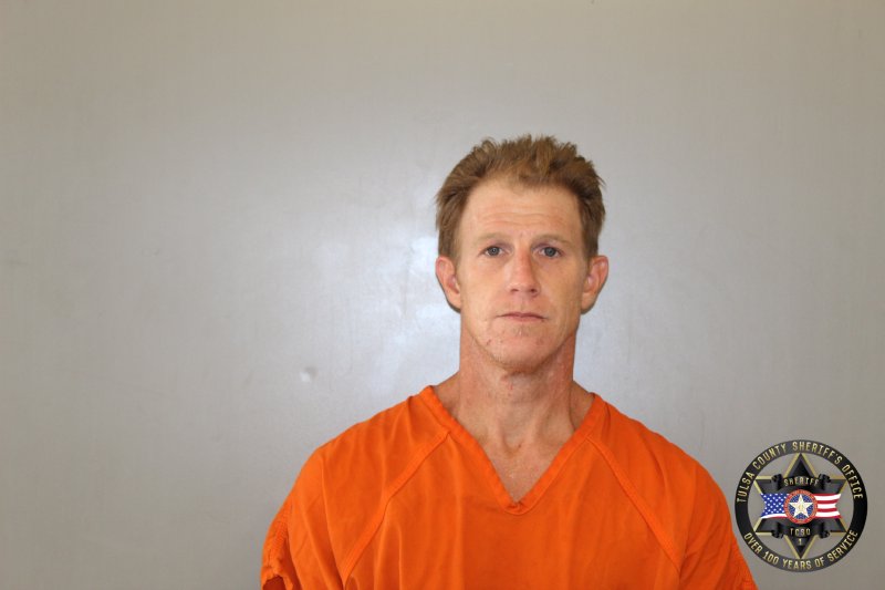 Booking photo of Aarron Denton