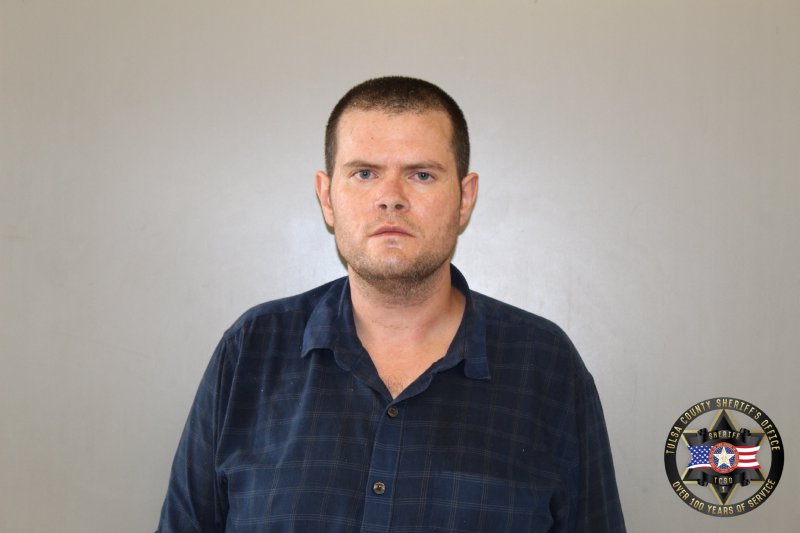Booking photo of Jeremy Wollmann