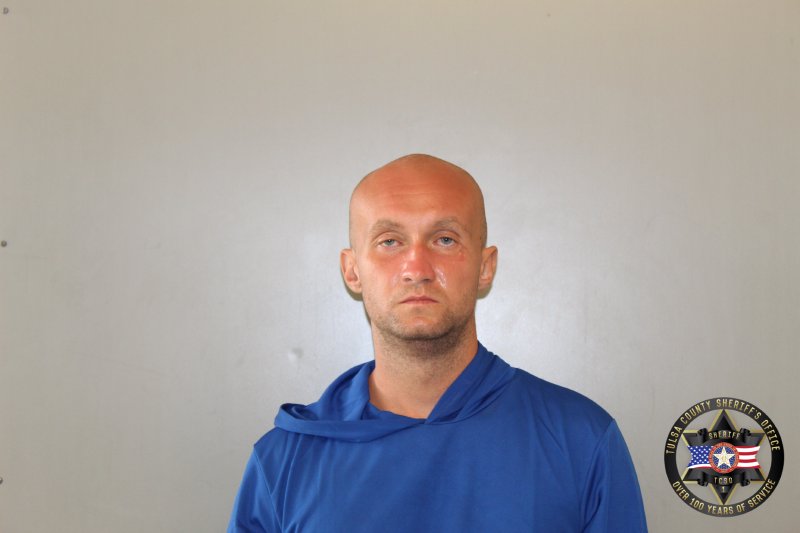 Booking photo of Evan Holt