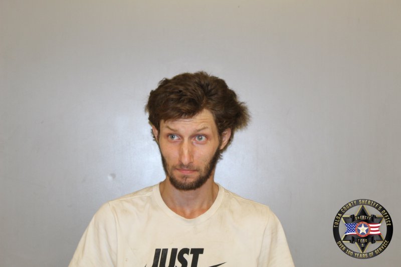 Booking photo of Justin Daugherty