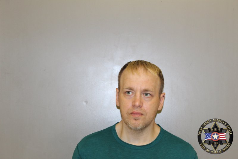 Booking photo of Adam Robbins
