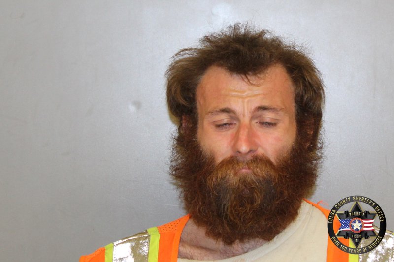 Booking photo of Ashton Sims