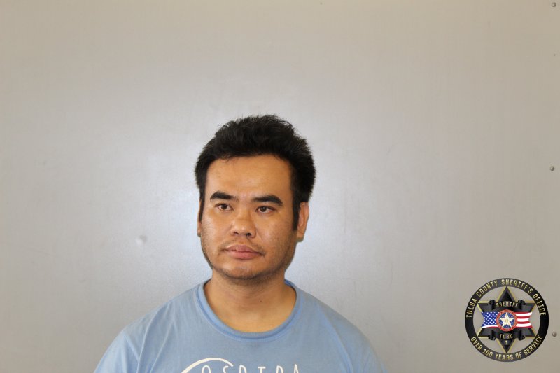 Booking photo of Thawng Pau
