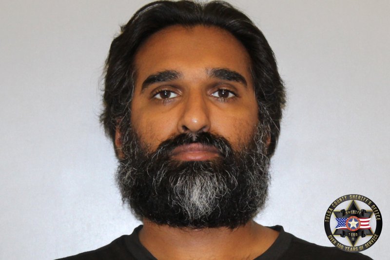 Booking photo of Aziz Moeez