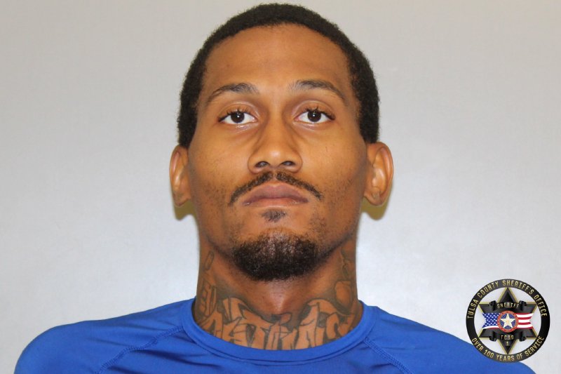 Booking photo of Adrian West