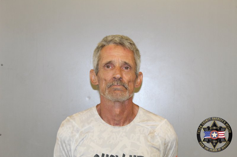 Booking photo of Anthony James