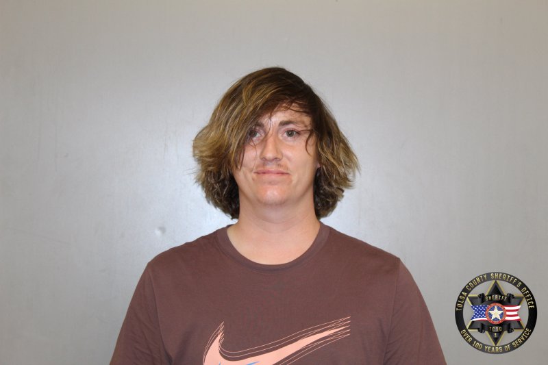 Booking photo of Colin Brewer
