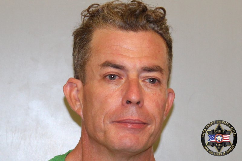 Booking photo of Adam Reid
