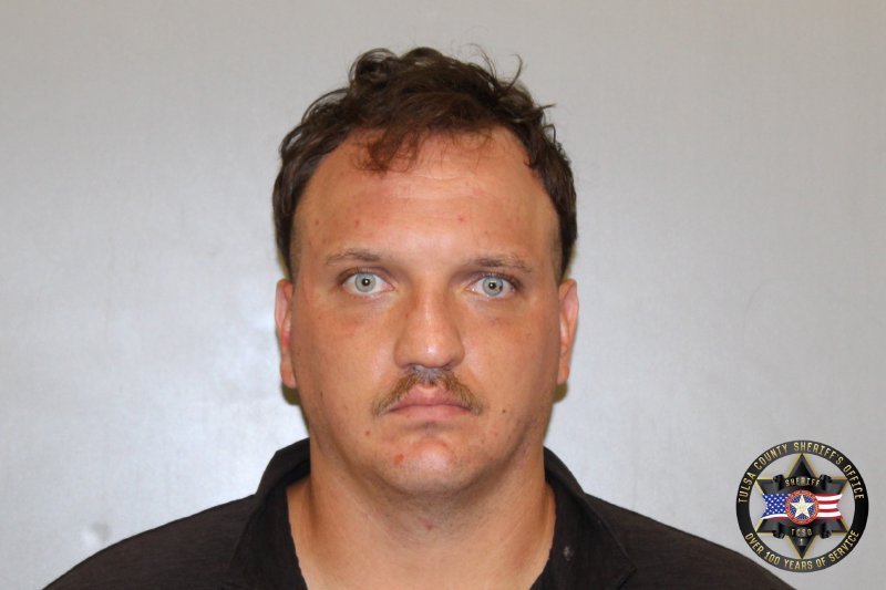 Booking photo of Mitchell Allen