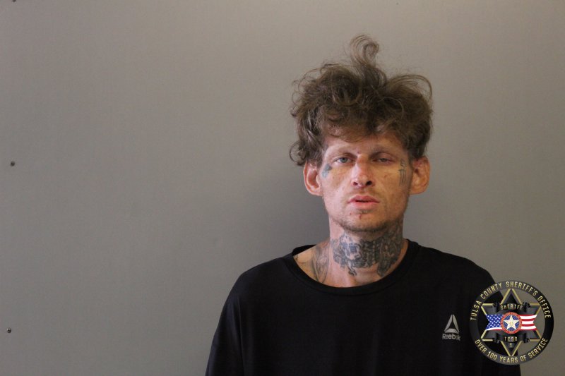 Booking photo of Guy Miller