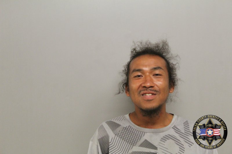 Booking photo of Kenneth Olanna