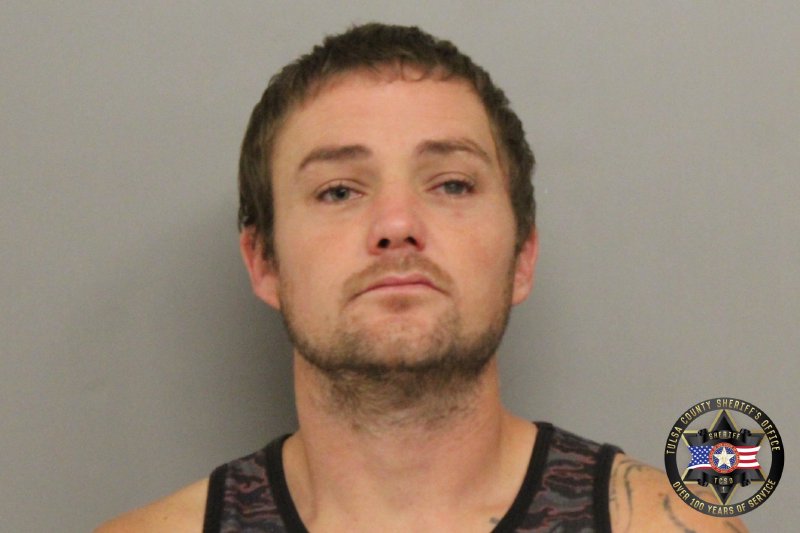 Booking photo of Travis Mcelhany