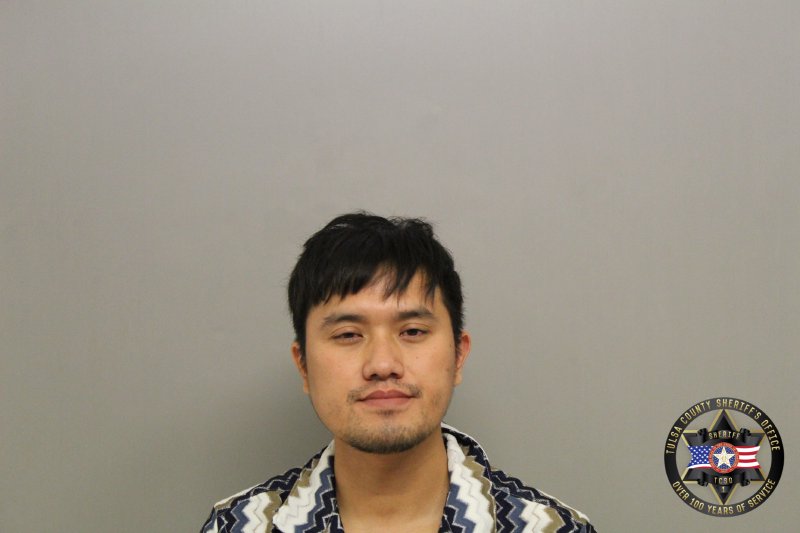 Booking photo of Mang Neu