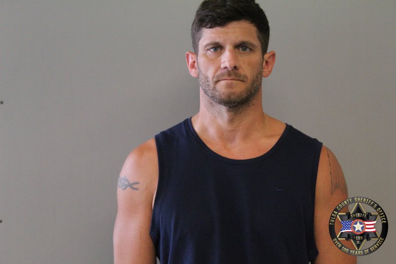Booking photo of Christopher Greene