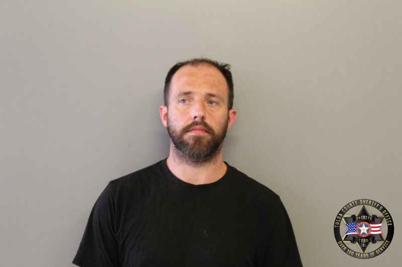 Booking photo of Michael Baker