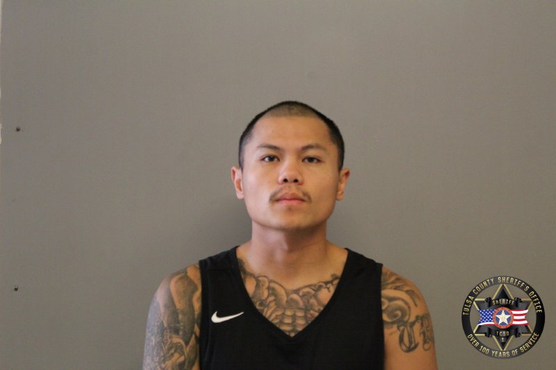 Booking photo of Thai Xiong