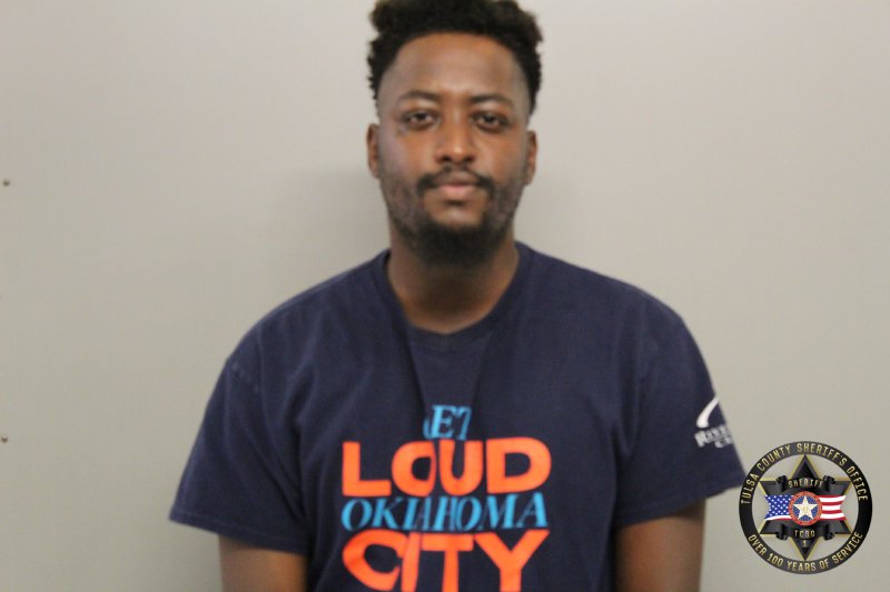Booking photo of Francis Ntimba