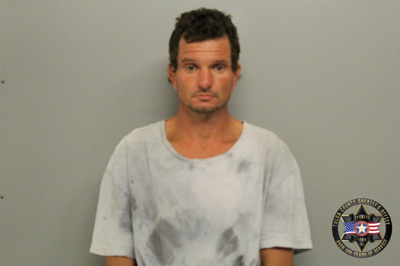 Booking photo of Jason Moore