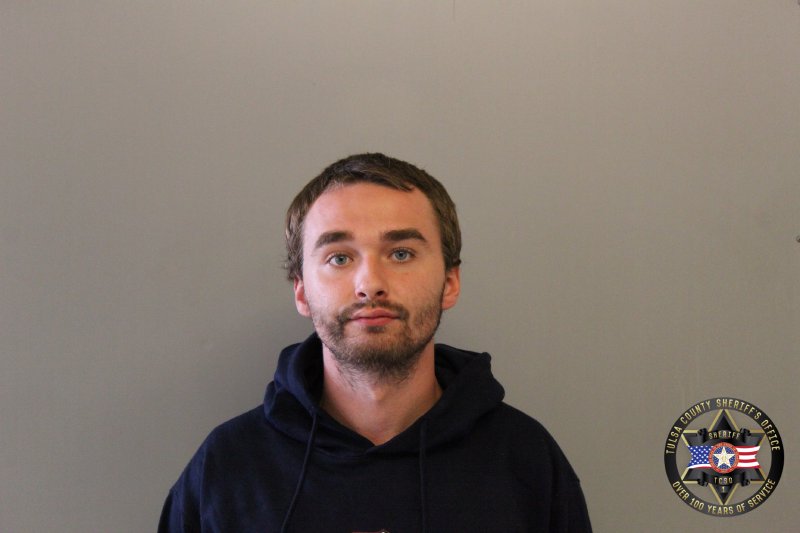 Booking photo of Alex Peterson-hendrickson