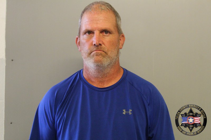 Booking photo of Ralph Searan