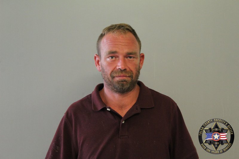 Booking photo of James Genson