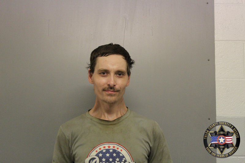 Booking photo of Douglas Rauchenstein