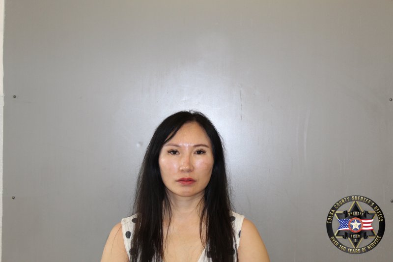 Booking photo of Xin Zhao