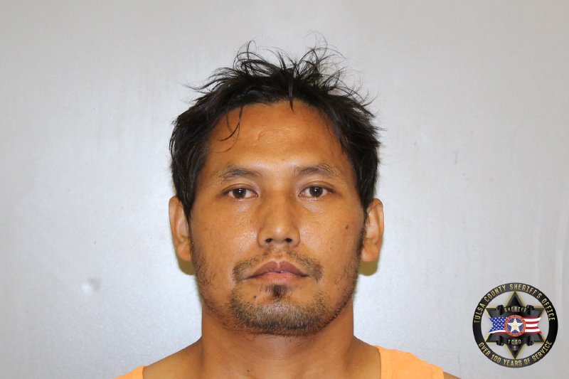 Booking photo of Lang Cin