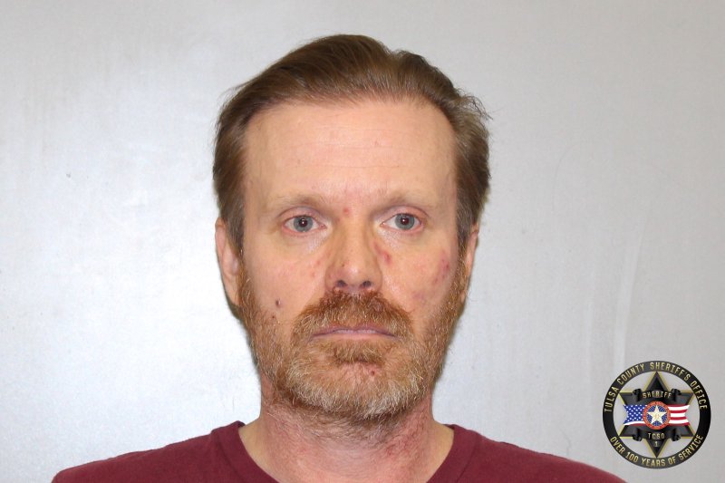 Booking photo of Brandon Delozier