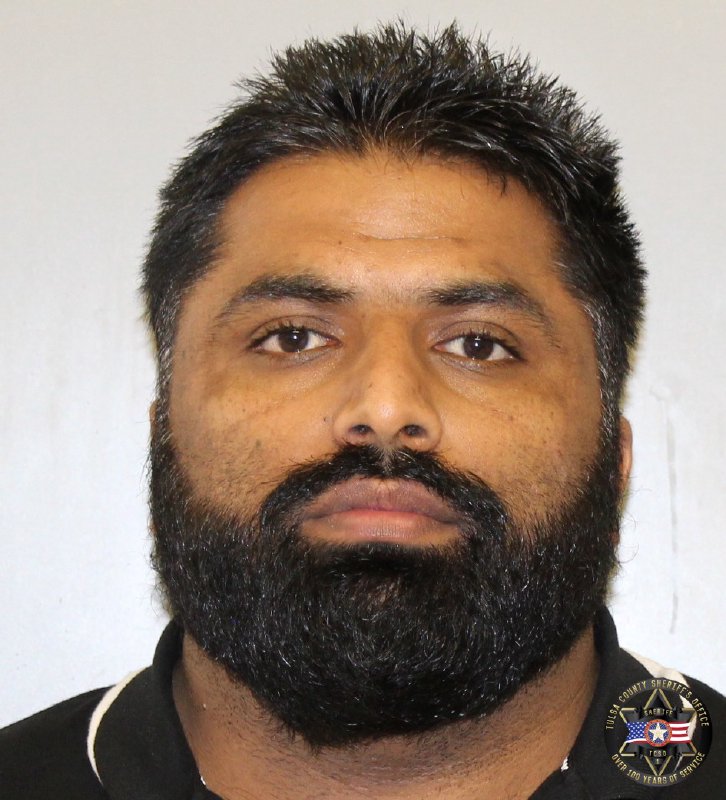 Booking photo of Muhammad Hussain