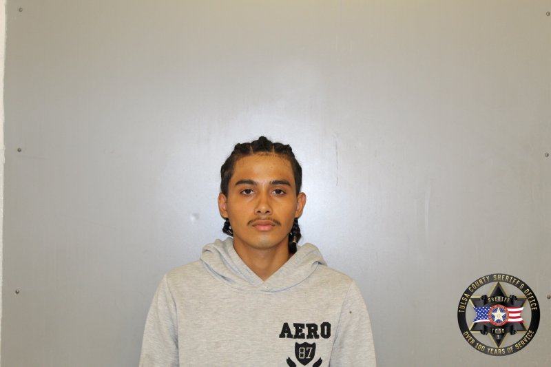Booking photo of Axel Moralez