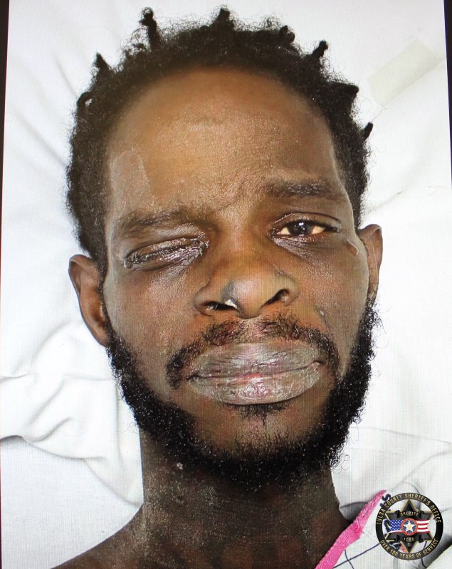 Booking photo of Lucien Auguste