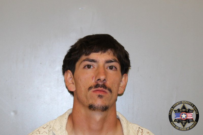 Booking photo of Mitchell Erickson