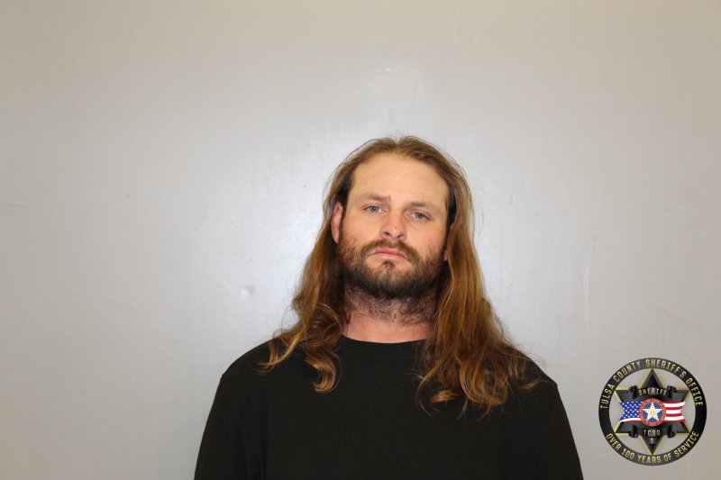 Booking photo of Brennan Doss