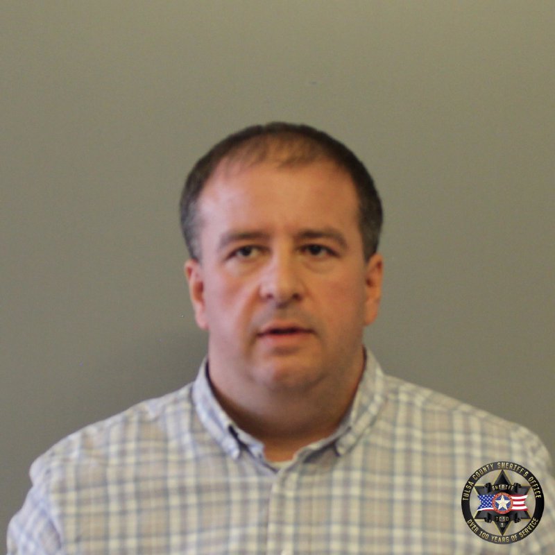 Booking photo of Adam Brasso