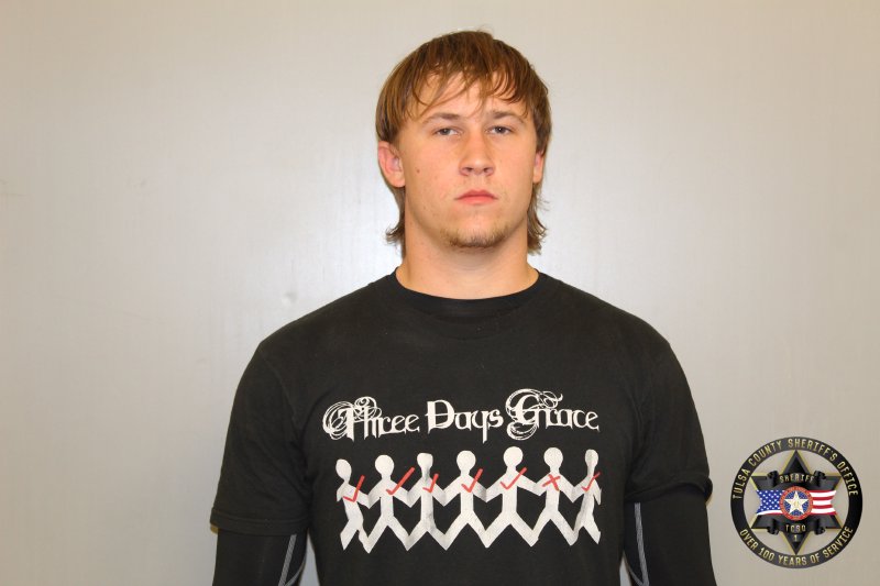 Booking photo of Ryan Miller