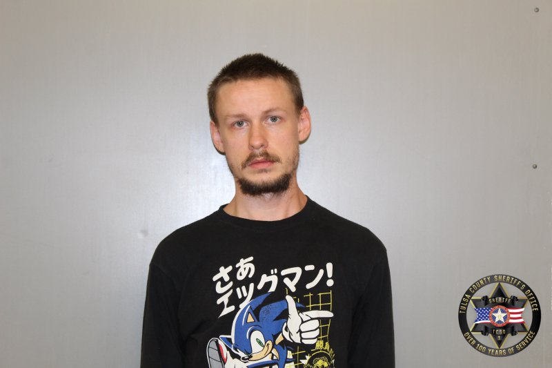 Zachary West booking photo